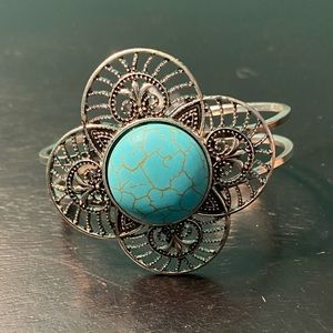 Flower shaped turquoise inspired cuff bracelet.